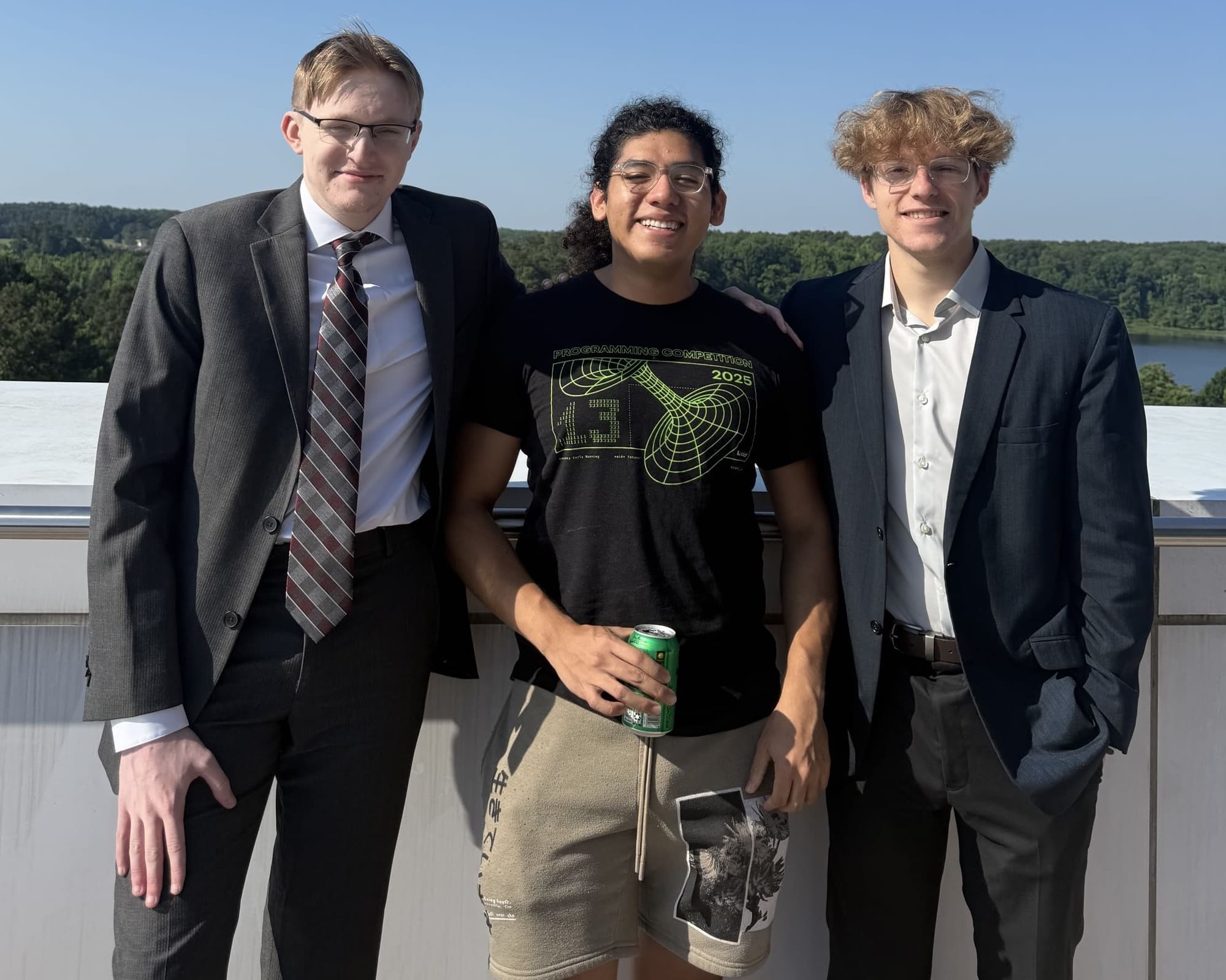 Members of the Thinking Machines club gathered on a staircase in the NC State Entrepreneurship Garage